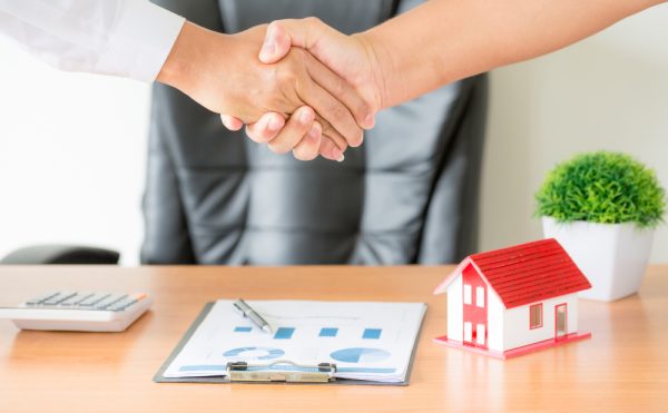 Hands Agent Client Shaking Hands After Signed Contract Buy New Apartment.jpg