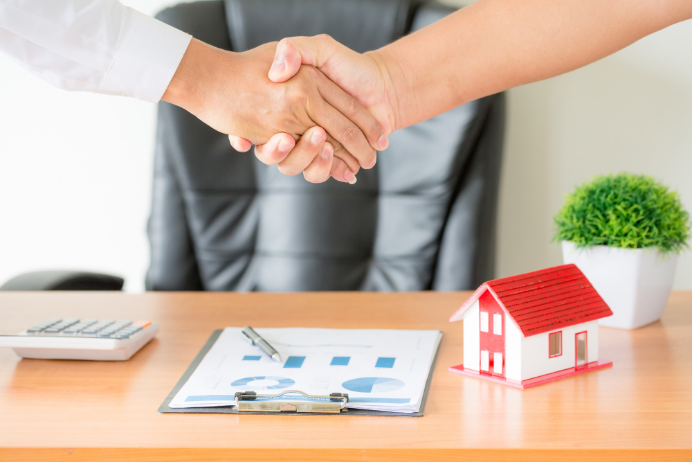 Hands Agent Client Shaking Hands After Signed Contract Buy New Apartment.jpg